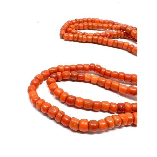 144 - Antique coral bead necklace measures approx 85cm long weight 40g