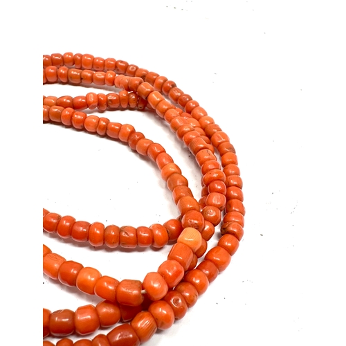 144 - Antique coral bead necklace measures approx 85cm long weight 40g