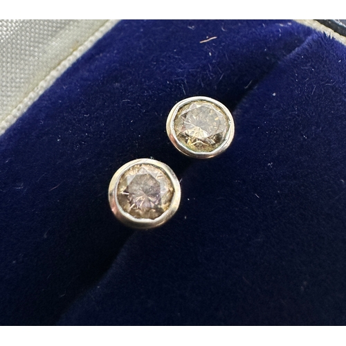 161 - 9ct gold champagne diamond earrings each diamond measures aprox 4mm dia