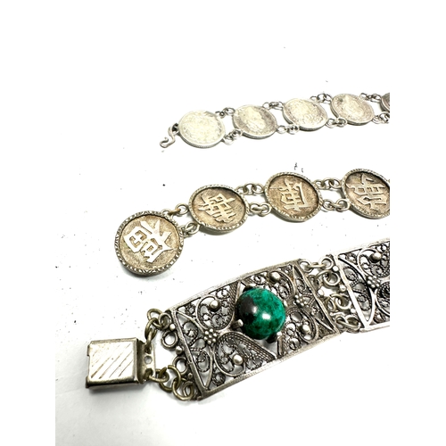 271 - 3 vintage silver bracelets inc chinese coin bracelet dutch silver coin bracelet etc weight 55g