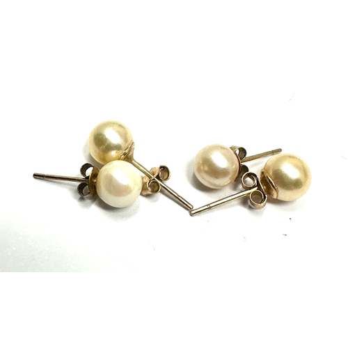 127 - 2 pairs of 9ct gold pearl earrings