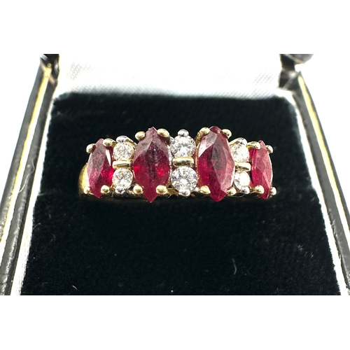 135 - 18ct gold diamond & ruby ring weight 3.6g