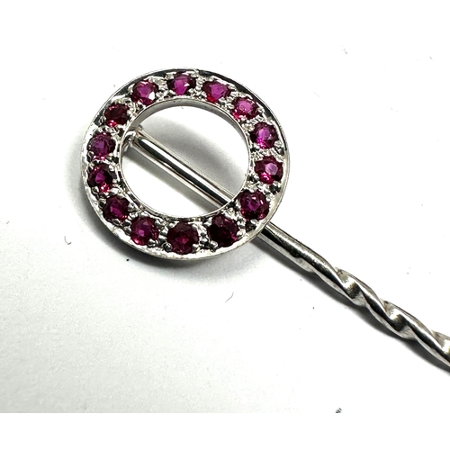 201 - Antique white gold ruby stick pin measures approx 5.7cm long weight 1.8g