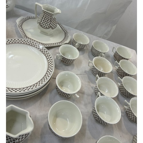 199 - Selection of part tea and dinner services to include maker Adams, TF & S, Limoges etc