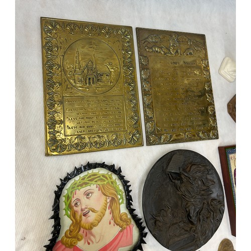 82 - Selection of religious items to include plaques, wooden carved plaque, figures