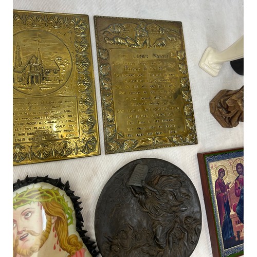 82 - Selection of religious items to include plaques, wooden carved plaque, figures