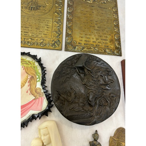 82 - Selection of religious items to include plaques, wooden carved plaque, figures