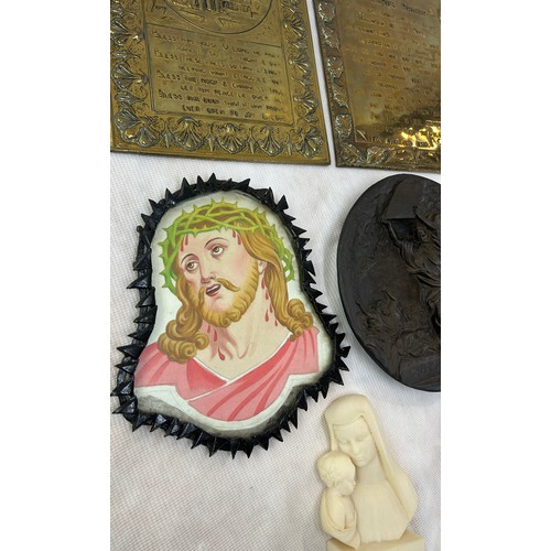 82 - Selection of religious items to include plaques, wooden carved plaque, figures