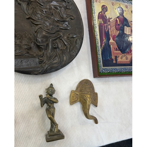 82 - Selection of religious items to include plaques, wooden carved plaque, figures