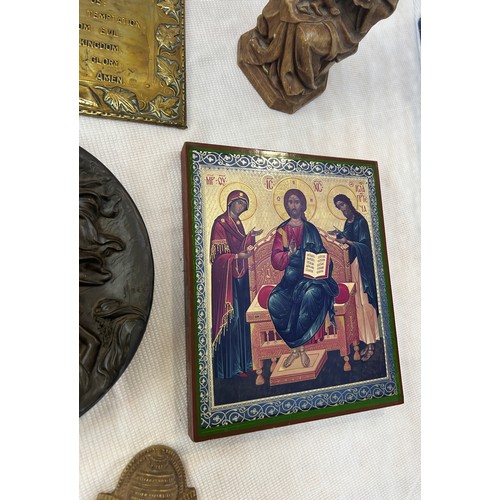 82 - Selection of religious items to include plaques, wooden carved plaque, figures