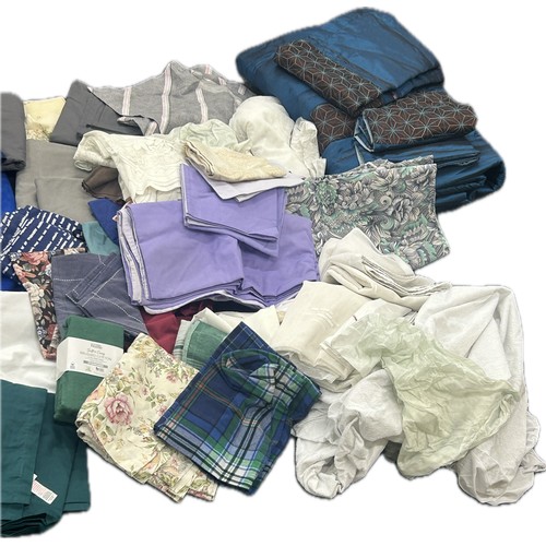 238 - Large selection of bedding, curtains, material etc