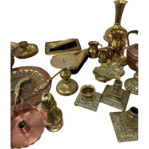 115 - Large selection of brassware to include candlesticks, jugs, plaques, vases, ornaments, small copper ... 