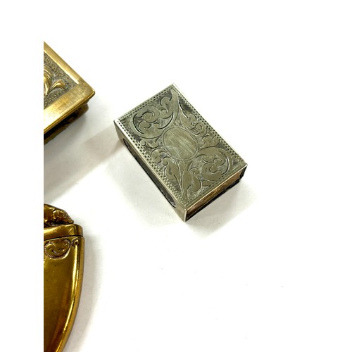 519 - Novelty 20th century brass vesta case in the shape of a boar tusk with a boar to the lid, brass matc... 