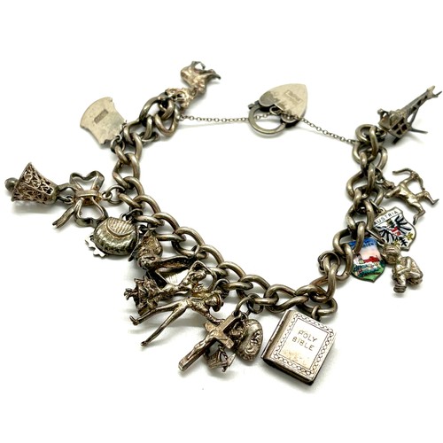 450 - Vintage silver charm bracelet, total approximate weight 58g