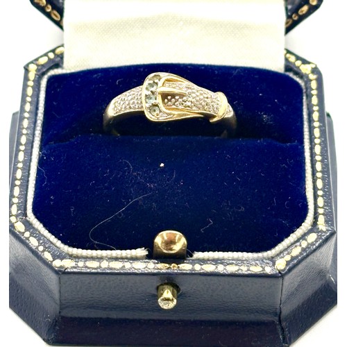 389 - 9ct gold and diamond buckle detail ladies ring, approximate overall weight 3.4g, ring size R