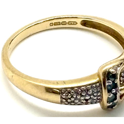 389 - 9ct gold and diamond buckle detail ladies ring, approximate overall weight 3.4g, ring size R