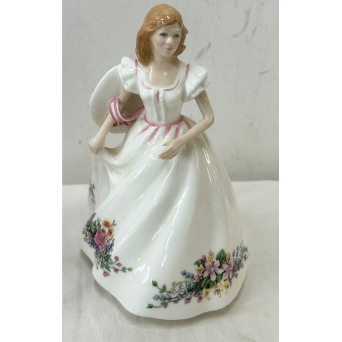 436 - Two Royal Doulton figurines one 'Figure of the year Patricia HN3365' and ' Joanne HN3422'