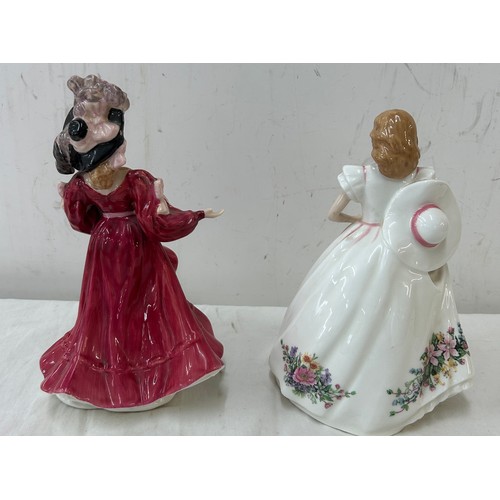 436 - Two Royal Doulton figurines one 'Figure of the year Patricia HN3365' and ' Joanne HN3422'