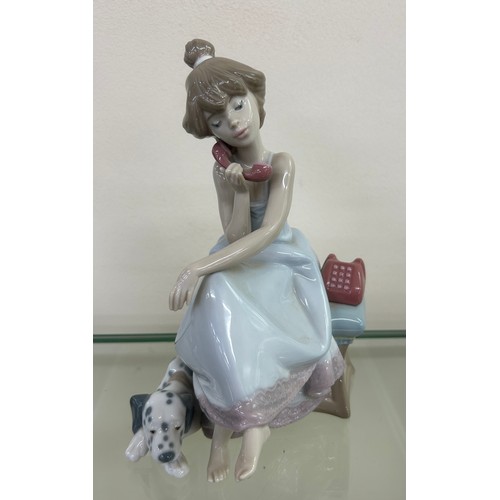 510 - Lladro chit chat girl on phone with Dalmatian dog dated 1987 over height approximately 8 inches