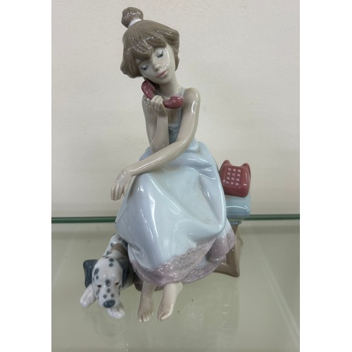 510 - Lladro chit chat girl on phone with Dalmatian dog dated 1987 over height approximately 8 inches