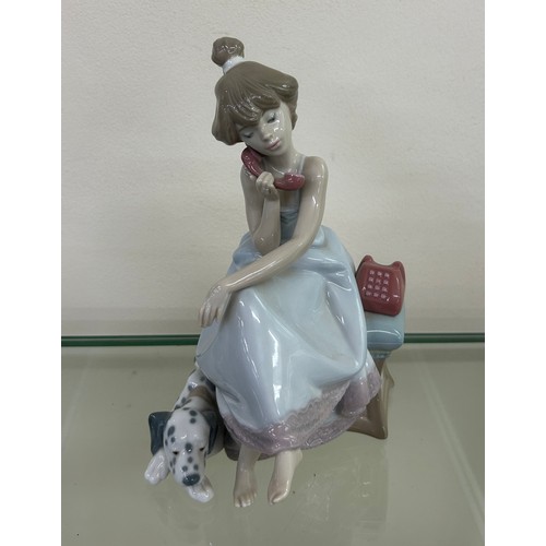 510 - Lladro chit chat girl on phone with Dalmatian dog dated 1987 over height approximately 8 inches