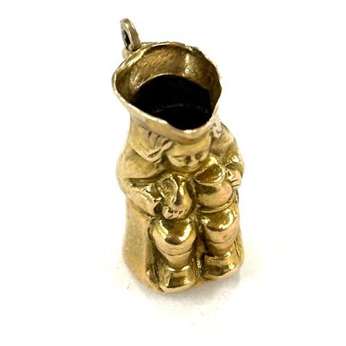 464 - 9ct gold character jug charm , approximate weight 1.6g