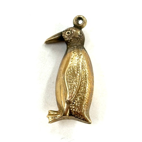 460 - 9ct gold penguin charm , approximate weight 1g