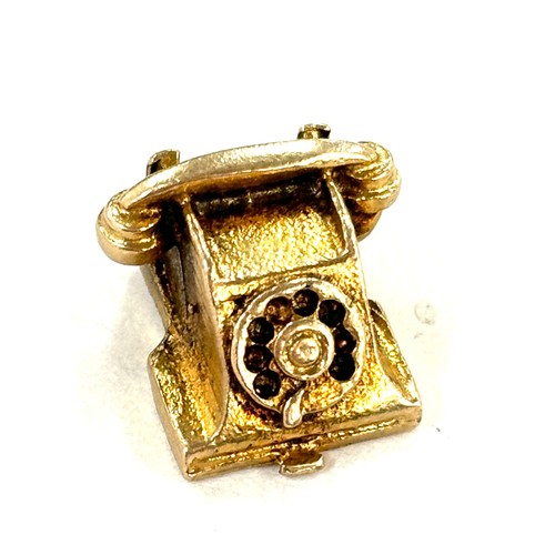 459 - 9ct gold telephone charm , approximate weight 1.9g