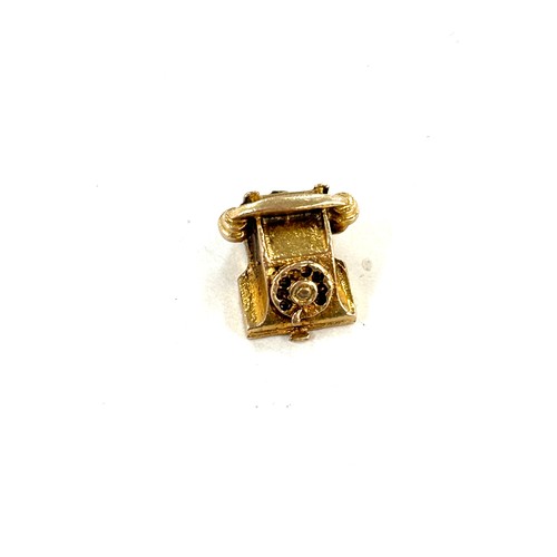 459 - 9ct gold telephone charm , approximate weight 1.9g