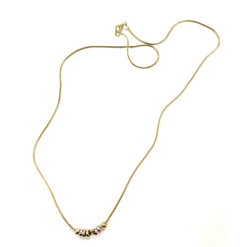 466 - Ladies 9ct gold ladies necklace with 3 tone gold bead detailing, approximate length of necklace 18 i... 