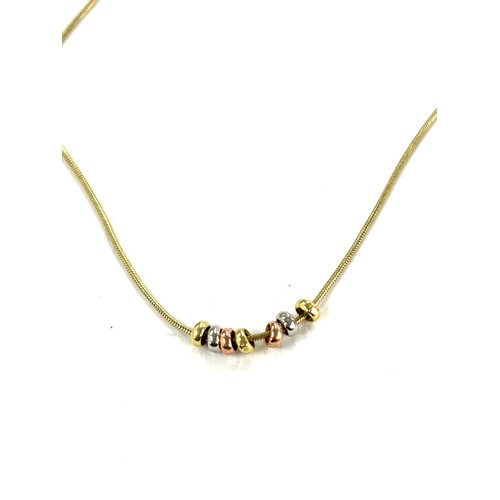 466 - Ladies 9ct gold ladies necklace with 3 tone gold bead detailing, approximate length of necklace 18 i... 