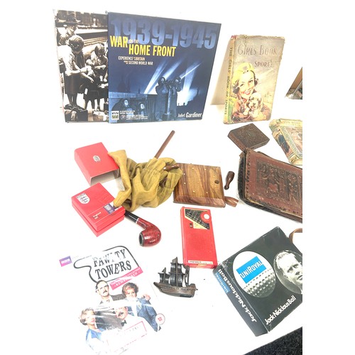 193 - Selection of collectable items to include annuals, lighter, vintage games etc