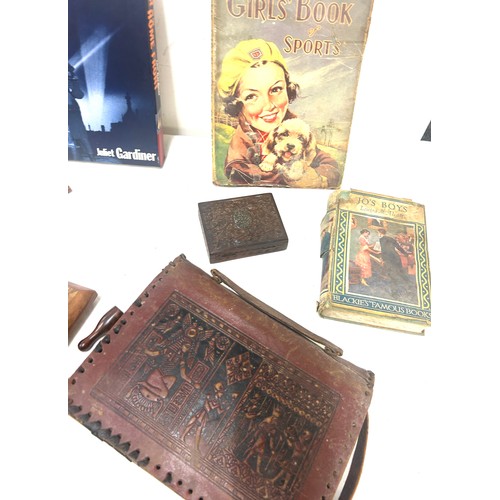 193 - Selection of collectable items to include annuals, lighter, vintage games etc