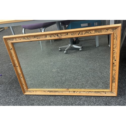 269 - Wall hanging mirror measures approximately 36 inches wide x 24 inches tall