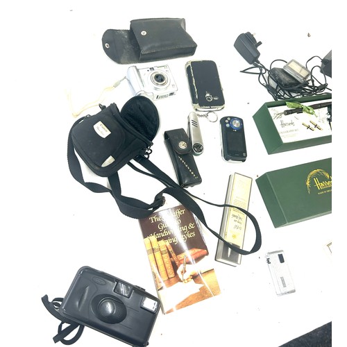 108 - Selection of miscellaneous to include electrical items radios, phones, pens etc