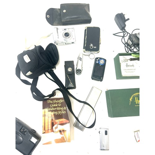 108 - Selection of miscellaneous to include electrical items radios, phones, pens etc