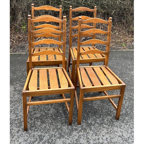 344A - Set of four golden oak Ercol ladder back chairs