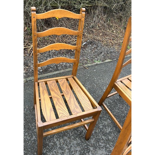 344A - Set of four golden oak Ercol ladder back chairs