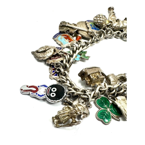 288 - Vintage silver charm bracelet & charms inc enamel town flags weight 65g