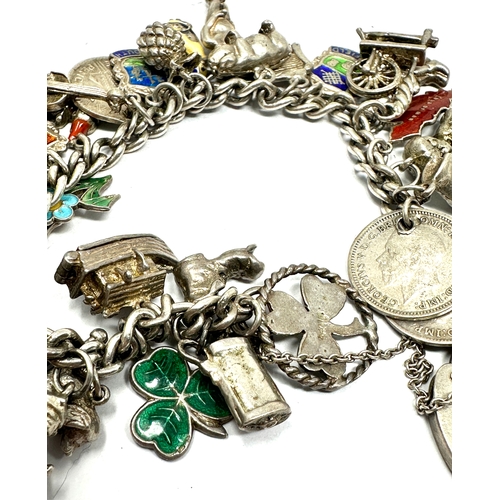 288 - Vintage silver charm bracelet & charms inc enamel town flags weight 65g