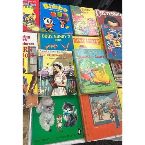 143 - Large selection of vintage childrens hardback annuals to include Bimbo etc