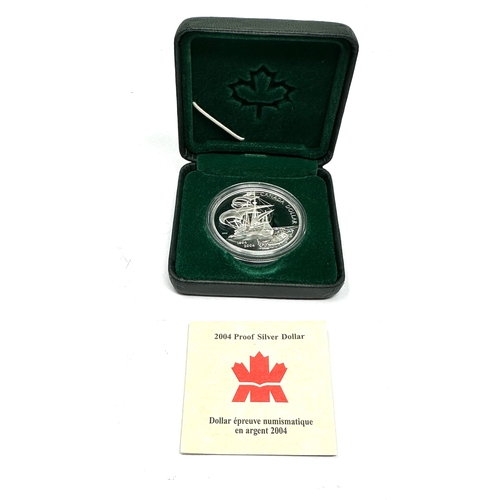 383 - Canadian proof silver dollar in pursuit of the new world 400th anniversary of the first french settl... 