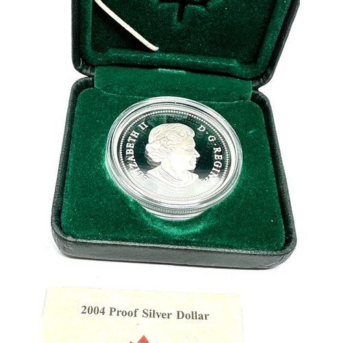 383 - Canadian proof silver dollar in pursuit of the new world 400th anniversary of the first french settl... 