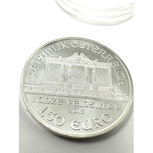 386 - Silver coin 999 1oz Austrian Philharmonic 2015  1.5 Euro in capsule