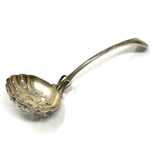 61 - Antique silver sifter spoon weight measures approx 21 cm long Birmingham silver hallmarks