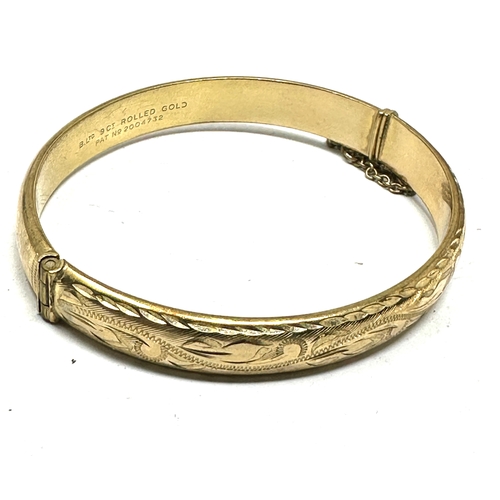 173 - 9ct gold rolled gold  bangle weight 11g