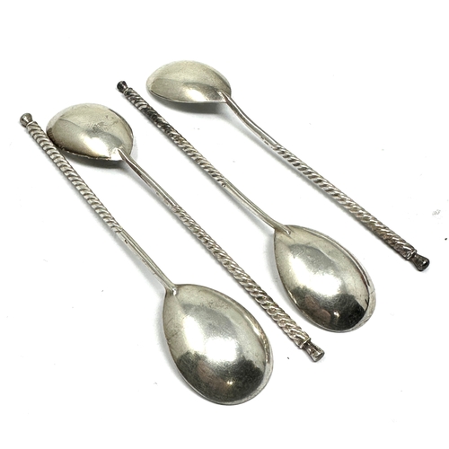 67 - 4 Antique russian silver spoons marked mk8 twist  handle each measure approx 13cm weight 66g