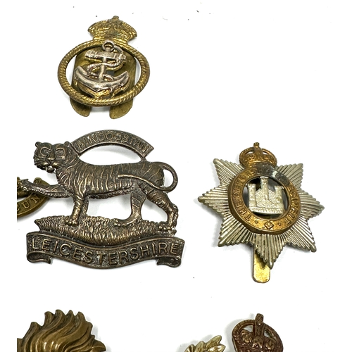 430 - 10 military cap badges