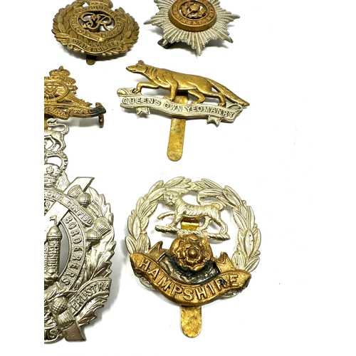 431 - 10 military cap badges