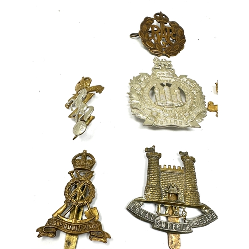 432 - 10 military cap badges